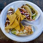 Calexico's  food (clockwise from left): chicken tamale, chipotle pork taco, a Calexico carne asada taco, shrimp quesadilla.